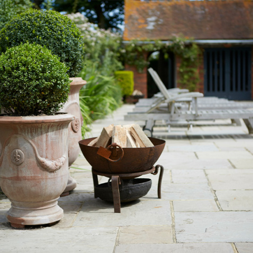 Natural Stone Or Porcelain Paving?